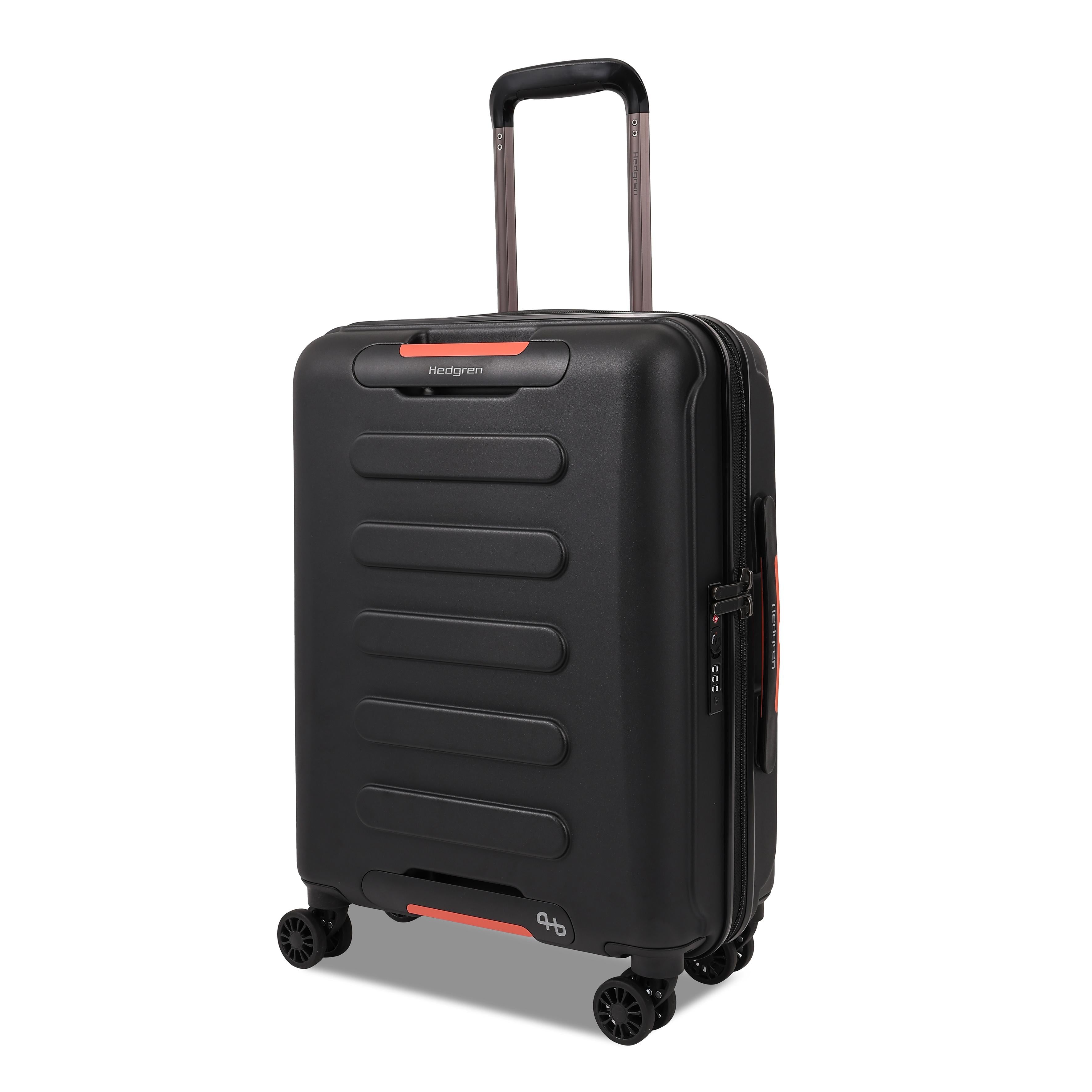 Angled view of the Hedgren Comby Grip luggage in Black, highlighting the unique front-panel handles and textured hard shell. Order Online Today