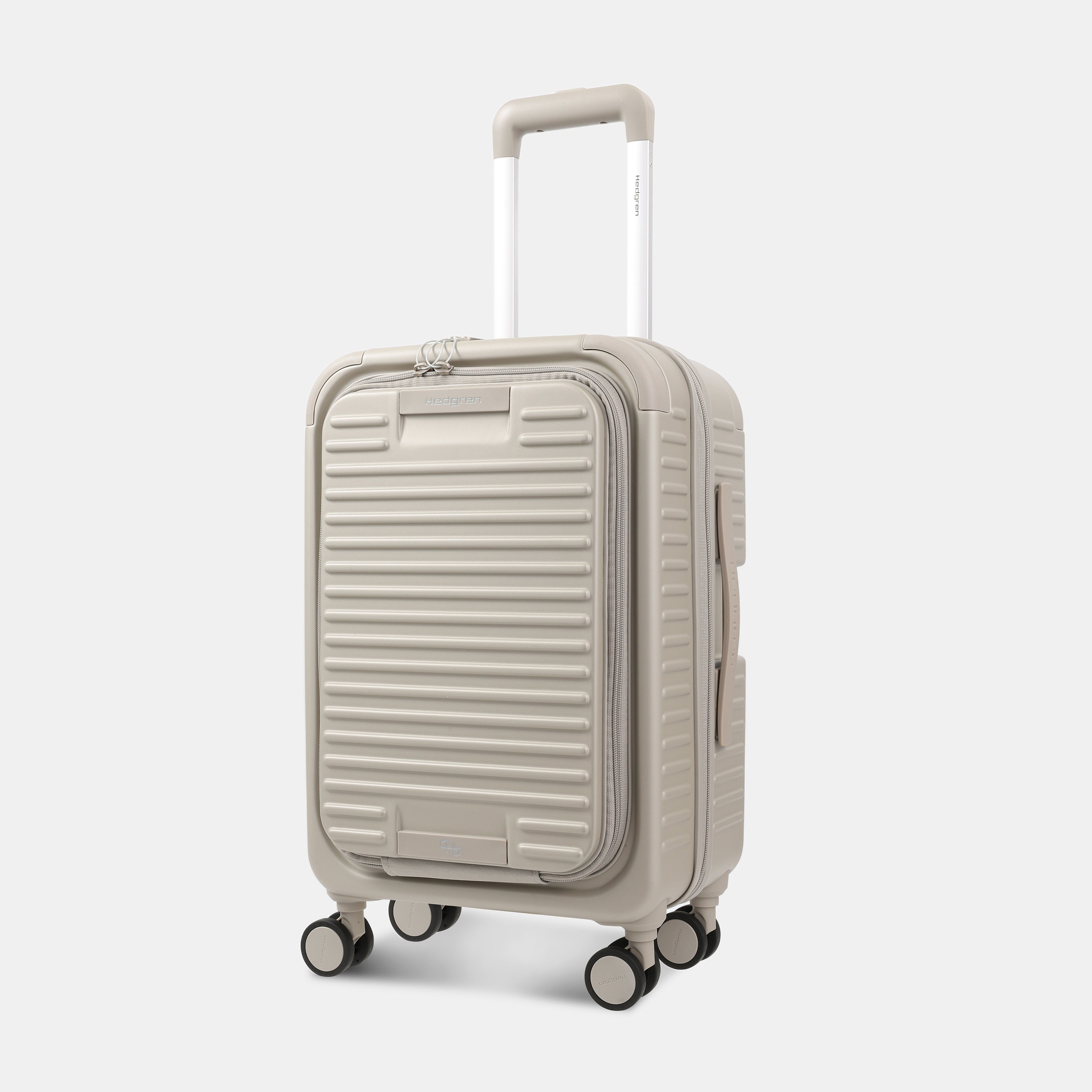 Angled view of the Hedgren Raku Yuno Front Pocket Luggage in Grey, showcasing the textured hard shell and expandable zipper detail. Shop Online at Mosafer Qatar