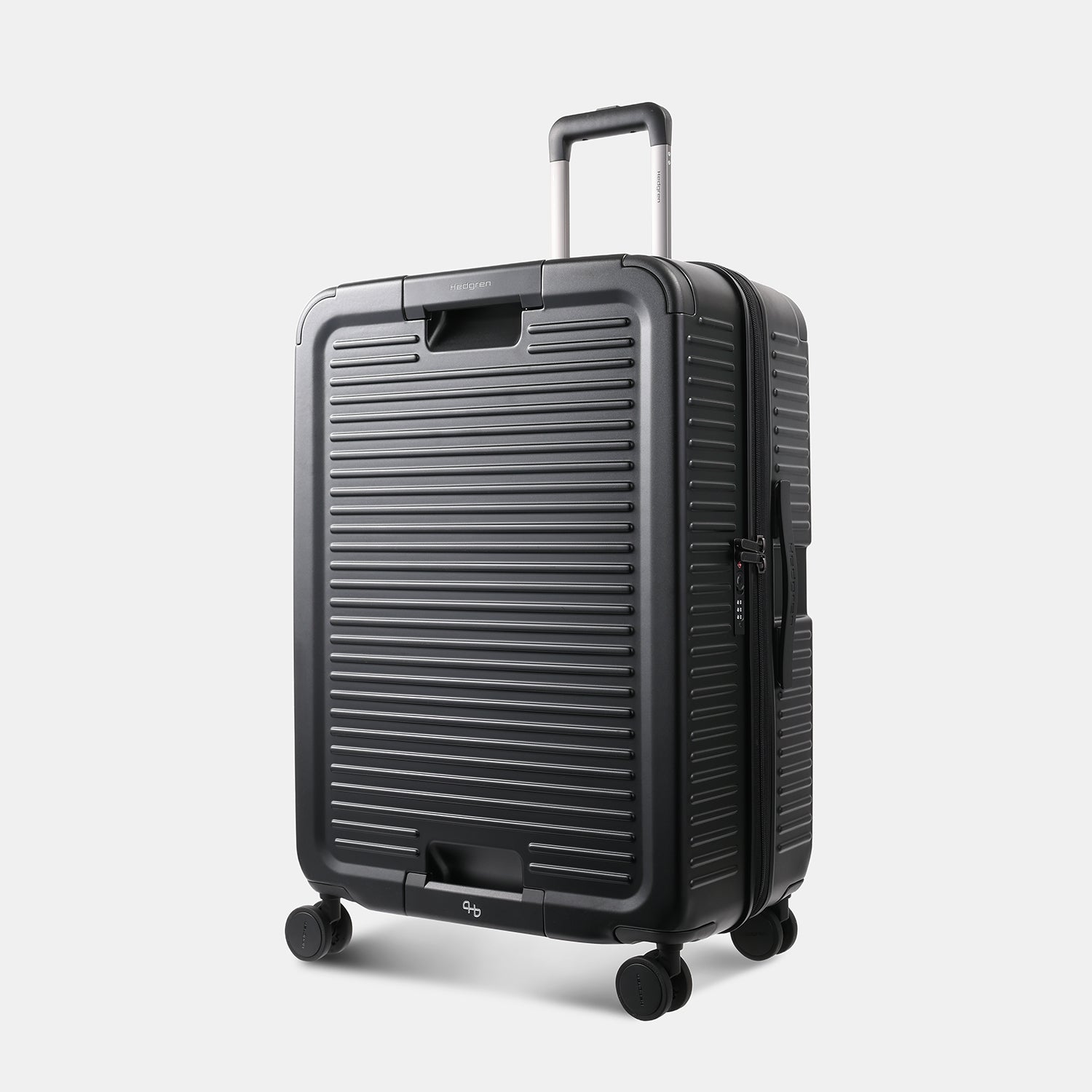 Angled view of the Hedgren Raku Yuno luggage in Black, showcasing the textured hard shell and expandable zipper detail. Available for Online Purchase