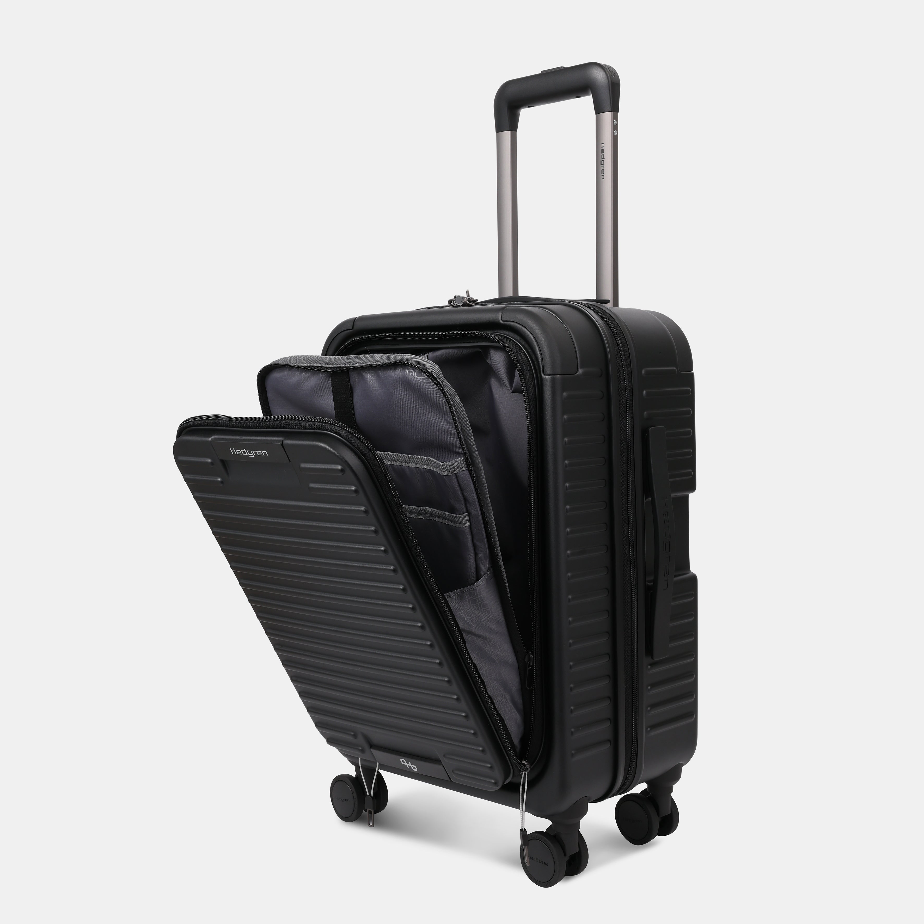 Angled view of the opened Hedgren Raku Yuno Front Pocket Luggage in Black, showcasing different layers. Shop Online at Mosafer Qatar