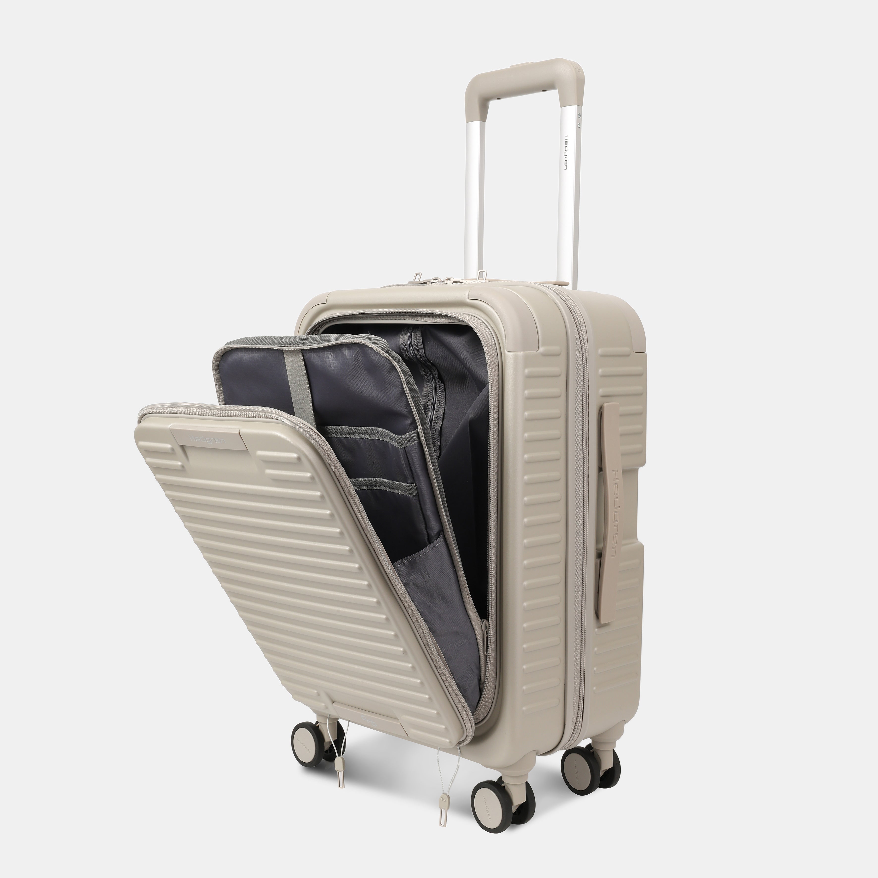 Angled view of the opened Hedgren Raku Yuno Front Pocket Luggage in Grey, showcasing different layers. Shop Online at Mosafer Qatar