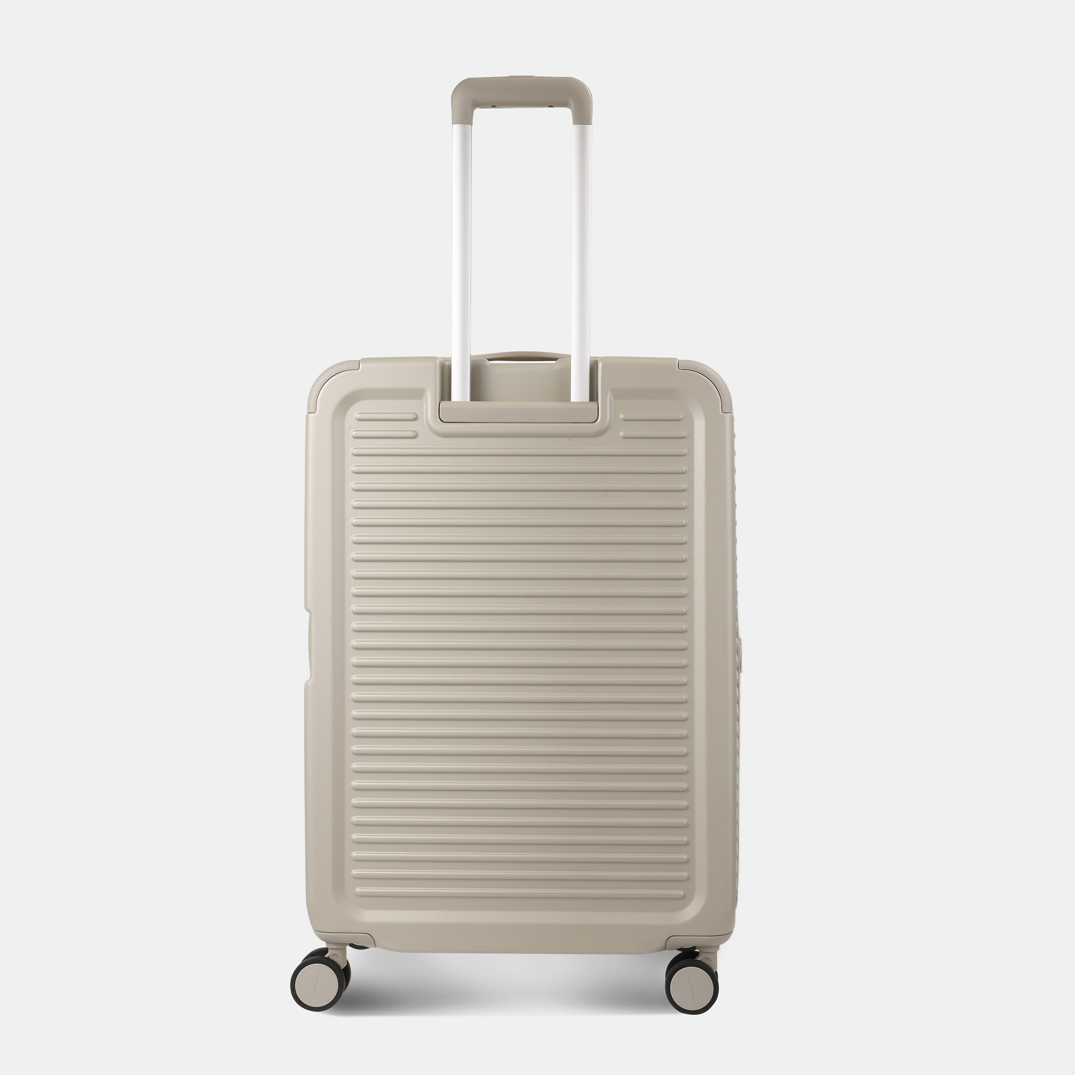 Back view of the Hedgren Raku Yuno luggage in Grey, showcasing the textured hard shell and expandable zipper detail. Available for Online Purchase