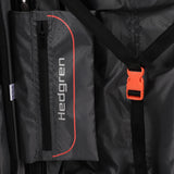 Close-up Inside view of the opened Hedgren Comby Grip luggage in Black, highlighting the organizing, secured belt and brand name. Order Online Today