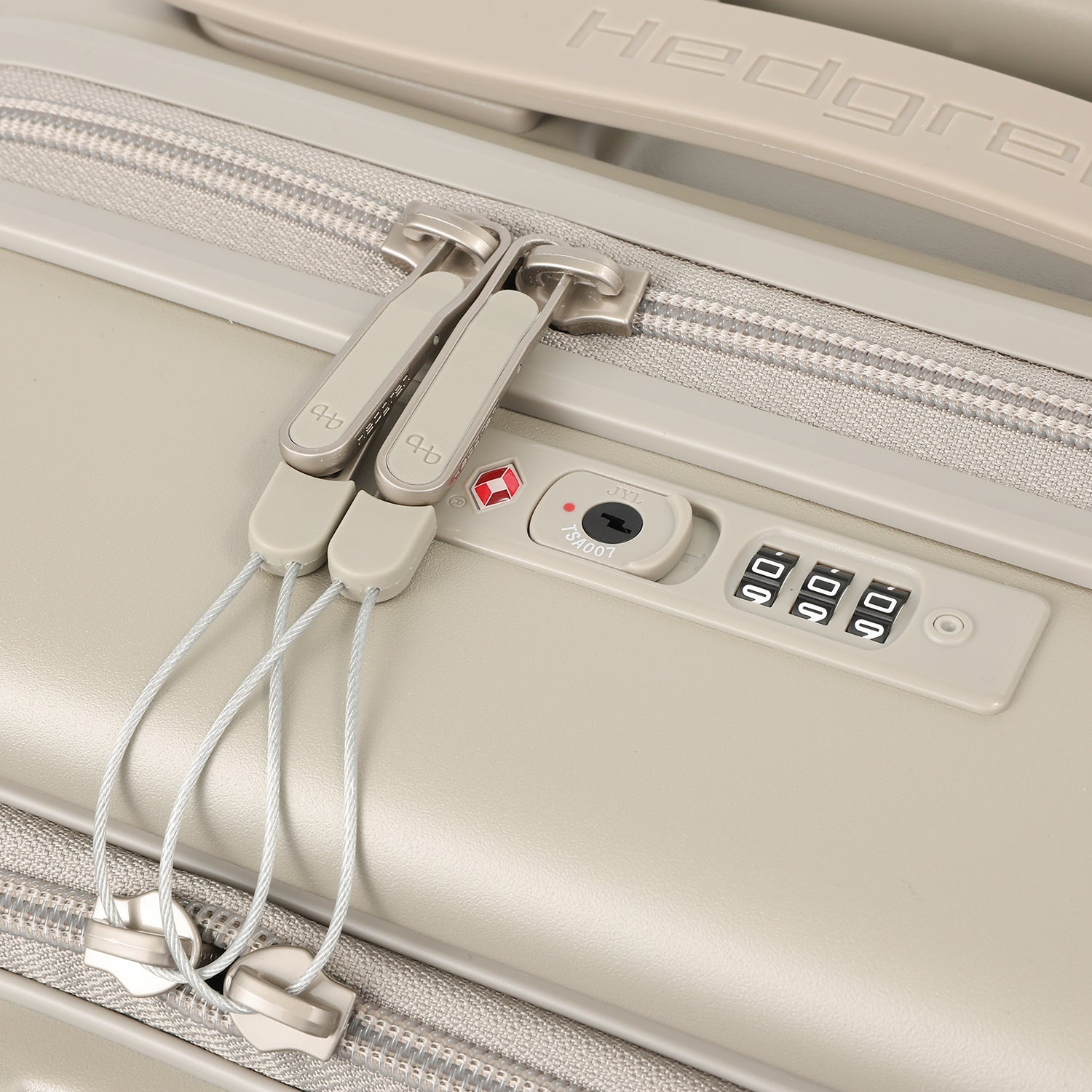 Close-up lock view of the Hedgren Raku Yuno Front Pocket Luggage in Grey, showcasing the secure lock. Shop Online at Mosafer Qatar
