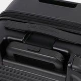 Close-up top view of the Hedgren Raku Yuno Front Pocket Luggage in Black, showcasing the expandable and carry handles. Shop Online at Mosafer Qatar