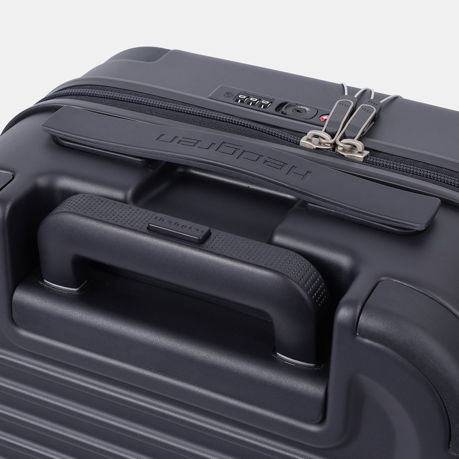 Close-up top view of the Hedgren Raku Yuno Front Pocket Luggage in Blue, showcasing the expandable and carry handles. Shop Online at Mosafer Qatar