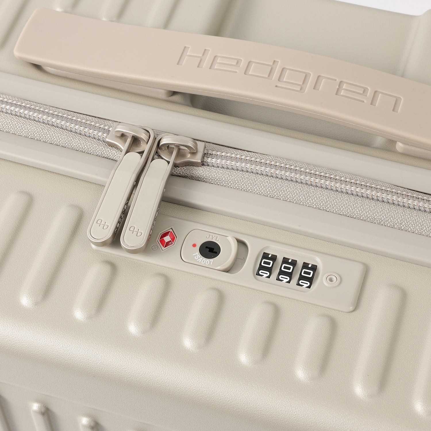 Close-up view of the Hedgren Raku Yuno luggage in Grey, showcasing the Lock detail. Available for Online Purchase