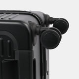 Close-up wheels view of the Hedgren Raku Yuno hard-shell luggage in Black, showcasing the spinner wheels. Shop the Latest Online