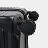 Close-up wheels view of the Hedgren Raku Yuno luggage in Black, showcasing the spinner wheels. Available for Online Purchase