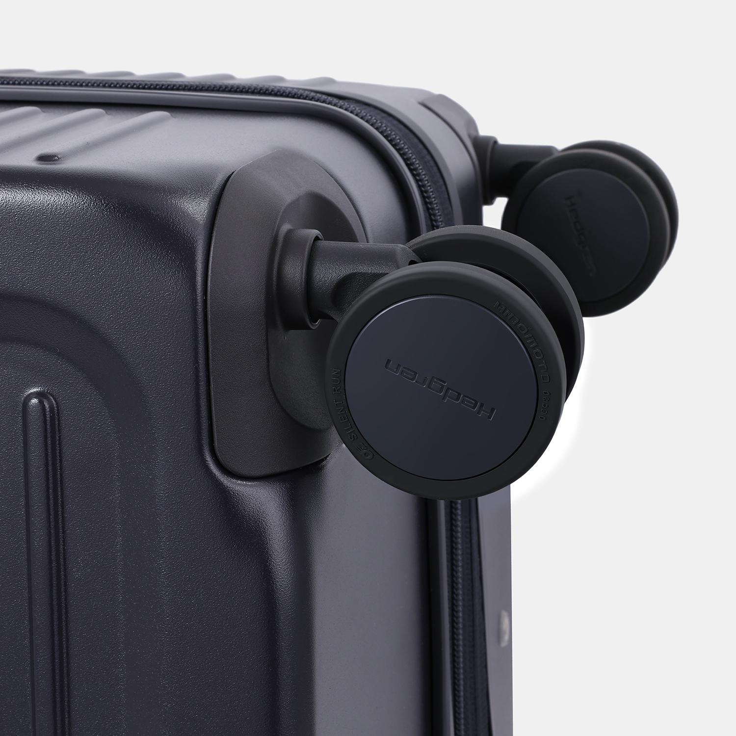 Close-up wheels view of the Hedgren Raku Yuno luggage in Blue, showcasing the spinner wheels. Available for Online Purchase