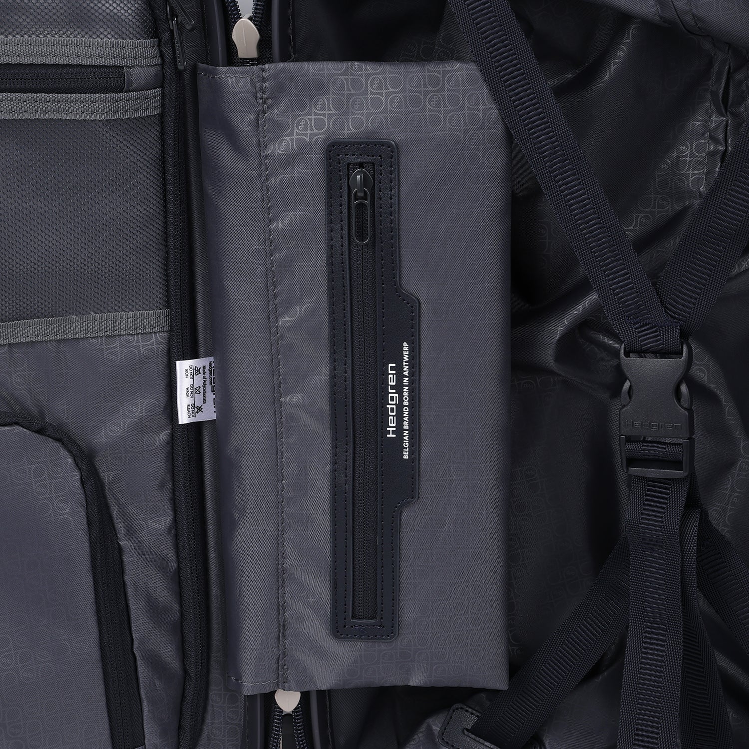 Close-up zipper view of the Hedgren Raku Yuno Front Pocket Luggage in Blue, showcasing the inside zipper and brand name. Shop Online at Mosafer Qatar