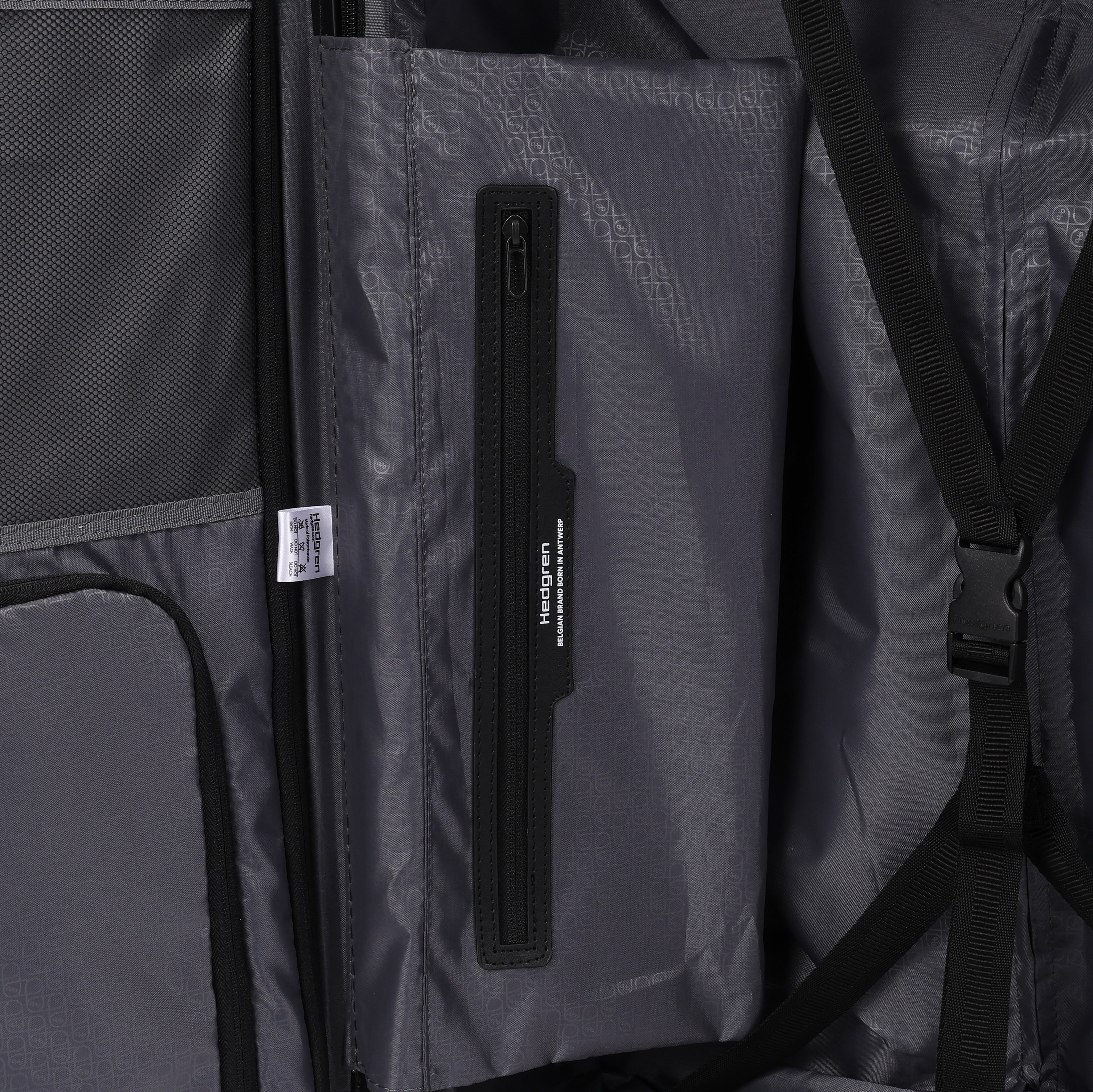 Inside close-up view of the Hedgren Raku Yuno luggage in Black, showcasing the belt and pocket. Available for Online Purchase