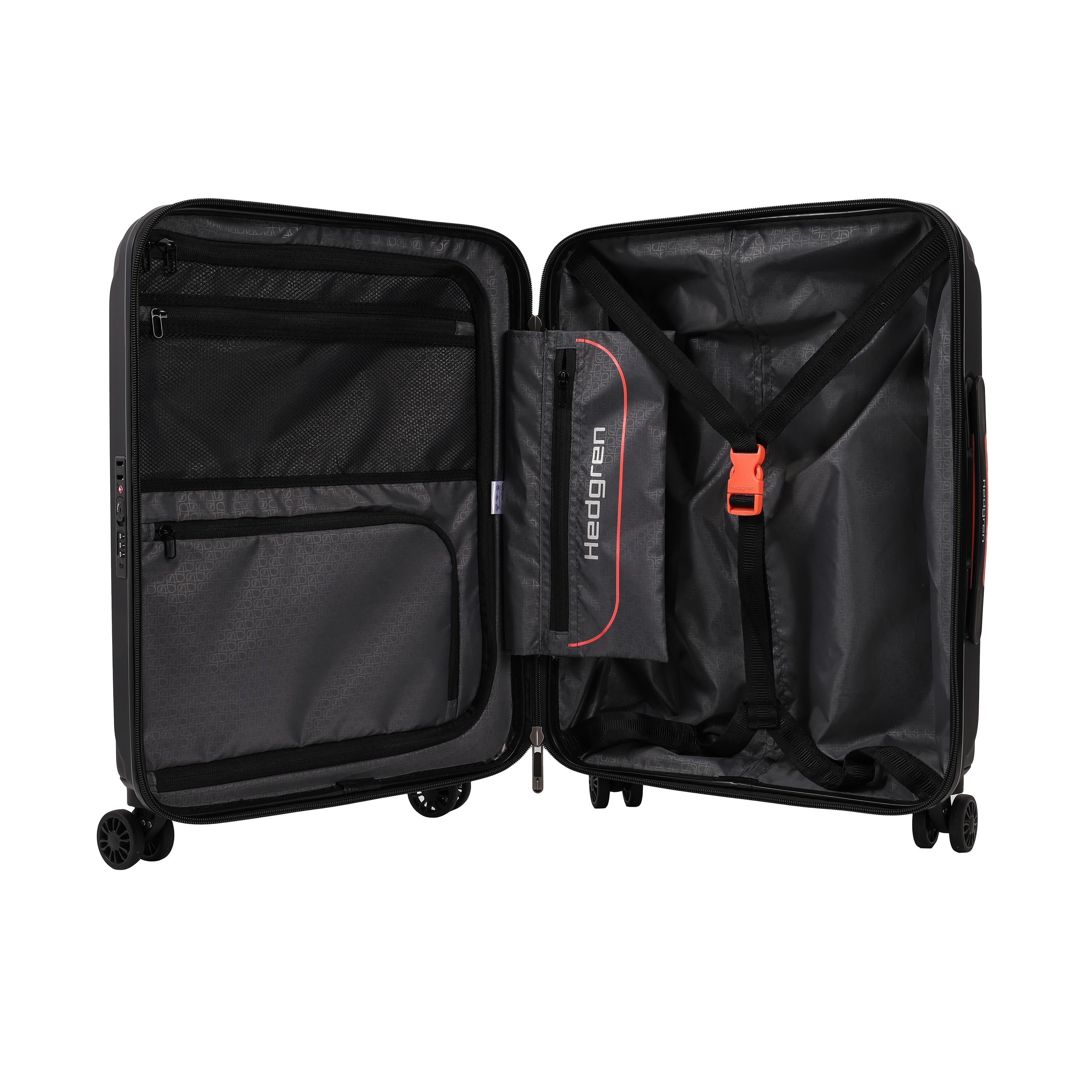 Inside view of the opened Hedgren Comby Grip luggage in Black, highlighting the organizing, secured belt and zipper pockets. Order Online Today