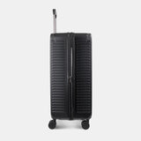Other Side view of the Hedgren Raku Yuno luggage in Black, showcasing the textured hard shell and expandable zipper detail. Available for Online Purchase