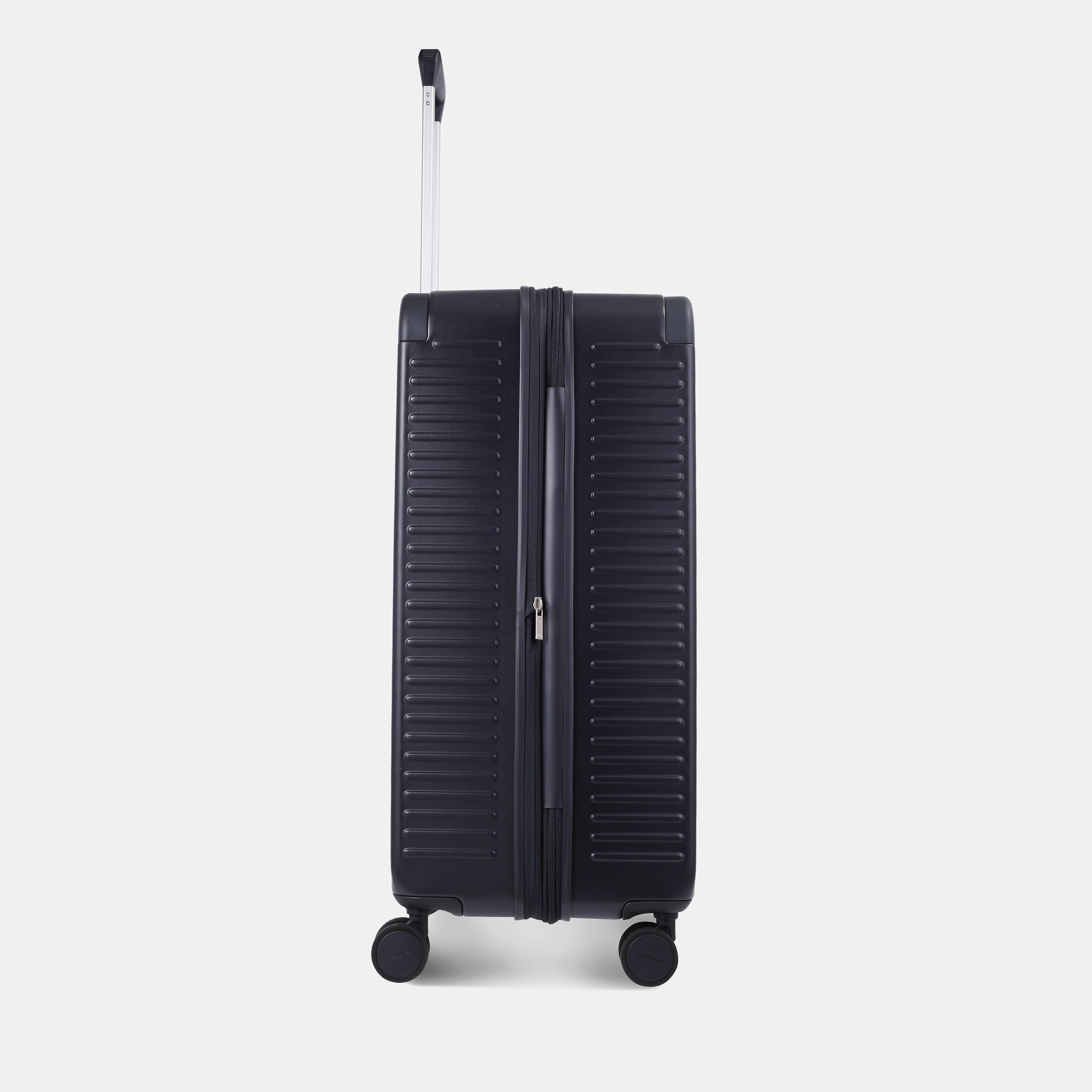 Other Side view of the Hedgren Raku Yuno luggage in Blue, showcasing the textured hard shell and expandable zipper detail. Available for Online Purchase