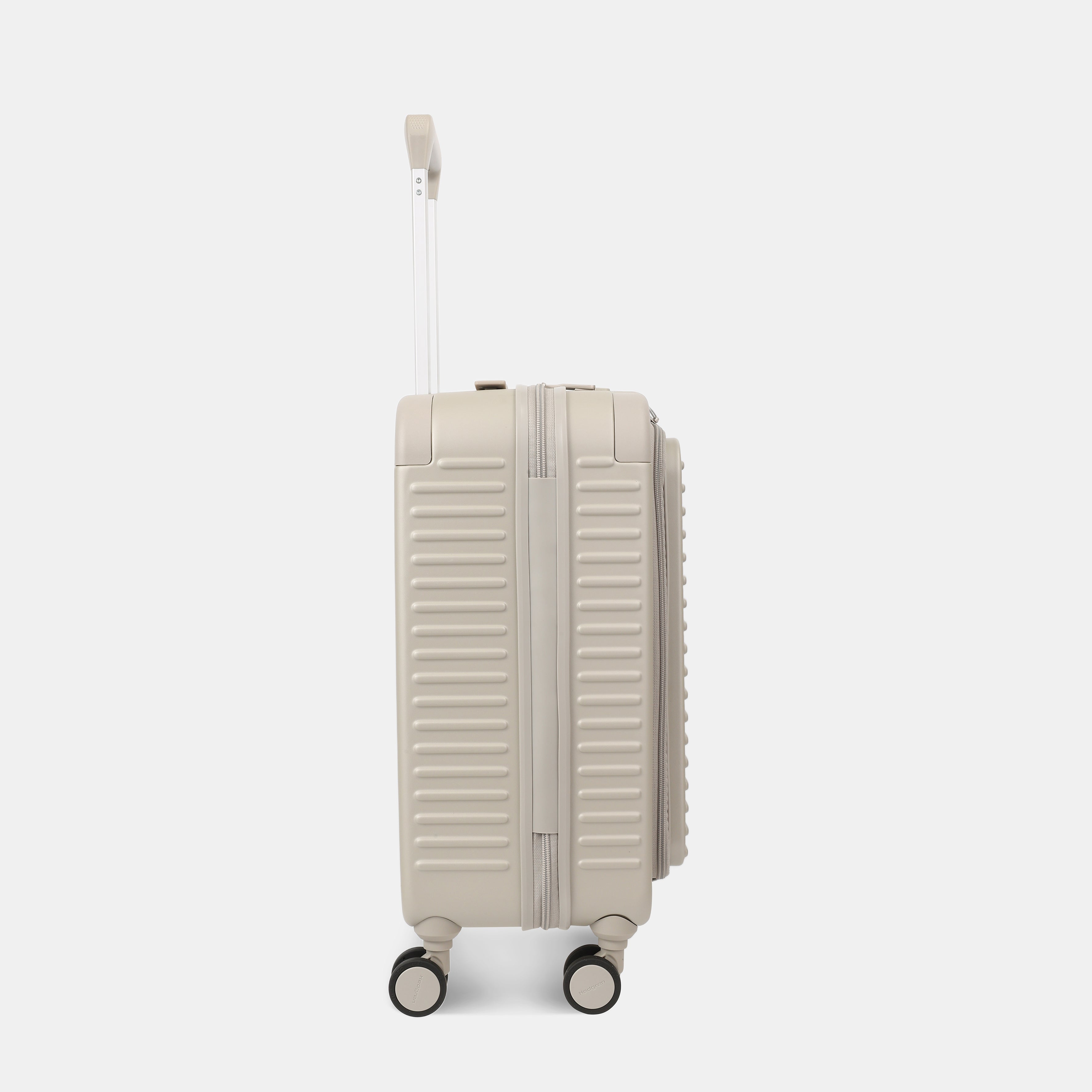Other side view of the Hedgren Raku Yuno Front Pocket Luggage in Grey, showcasing the textured hard shell and expandable zipper detail. Shop Online at Mosafer Qatar
