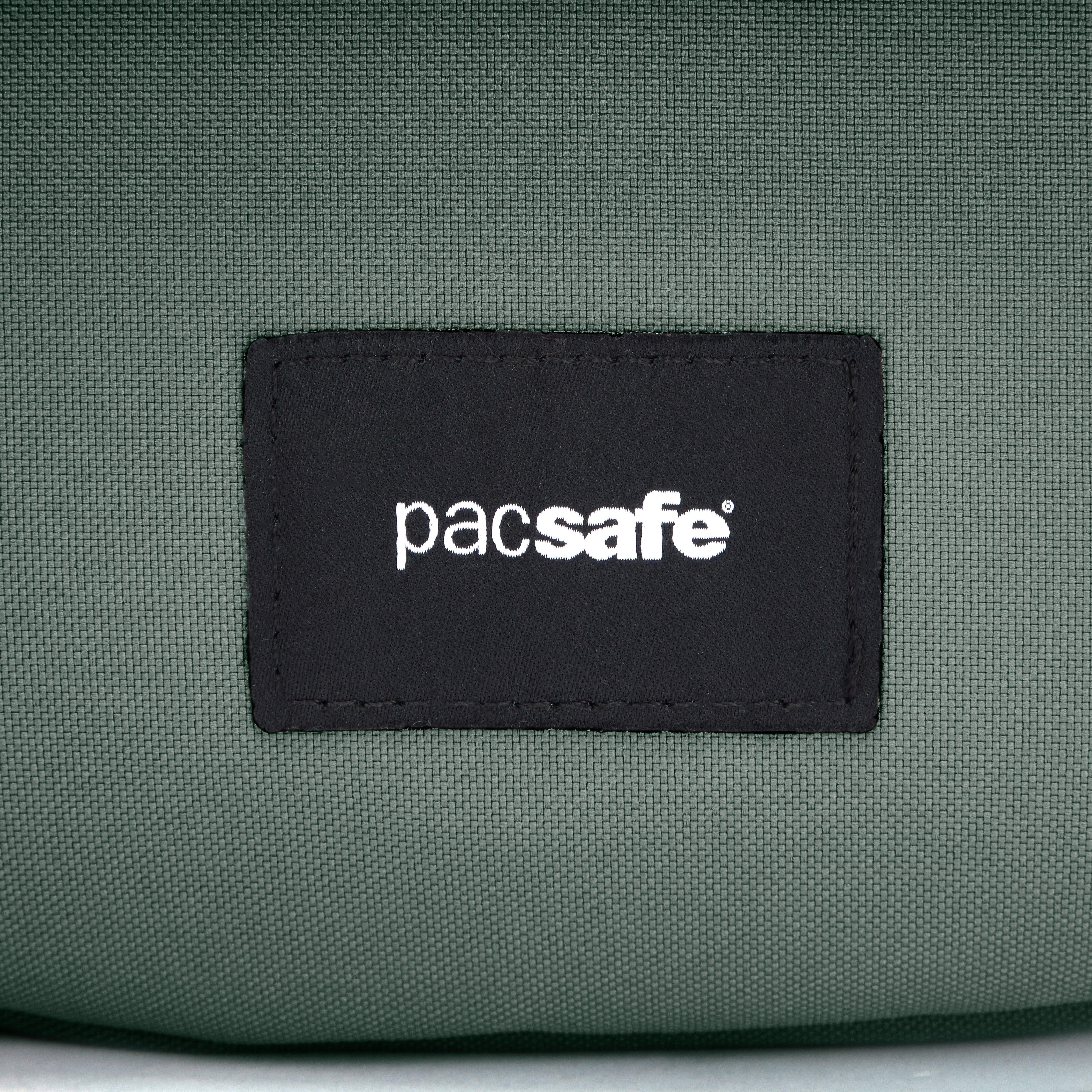PACSAFE GO SADDLE SPRUCE GREEN CROSS BODY BAG
