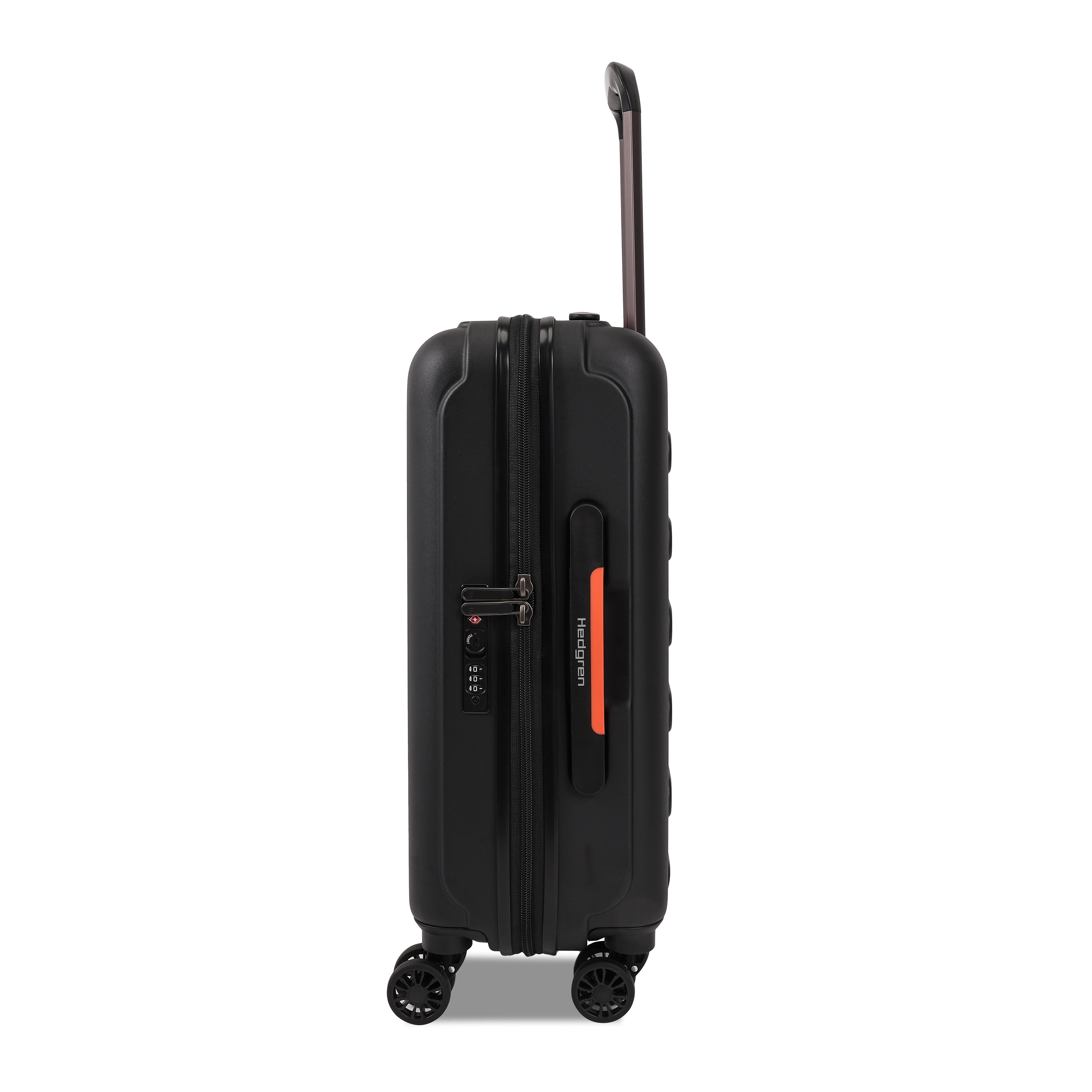 Side view of the Hedgren Comby Grip luggage in Black, highlighting the unique front-panel handles and textured hard shell. Order Online Today