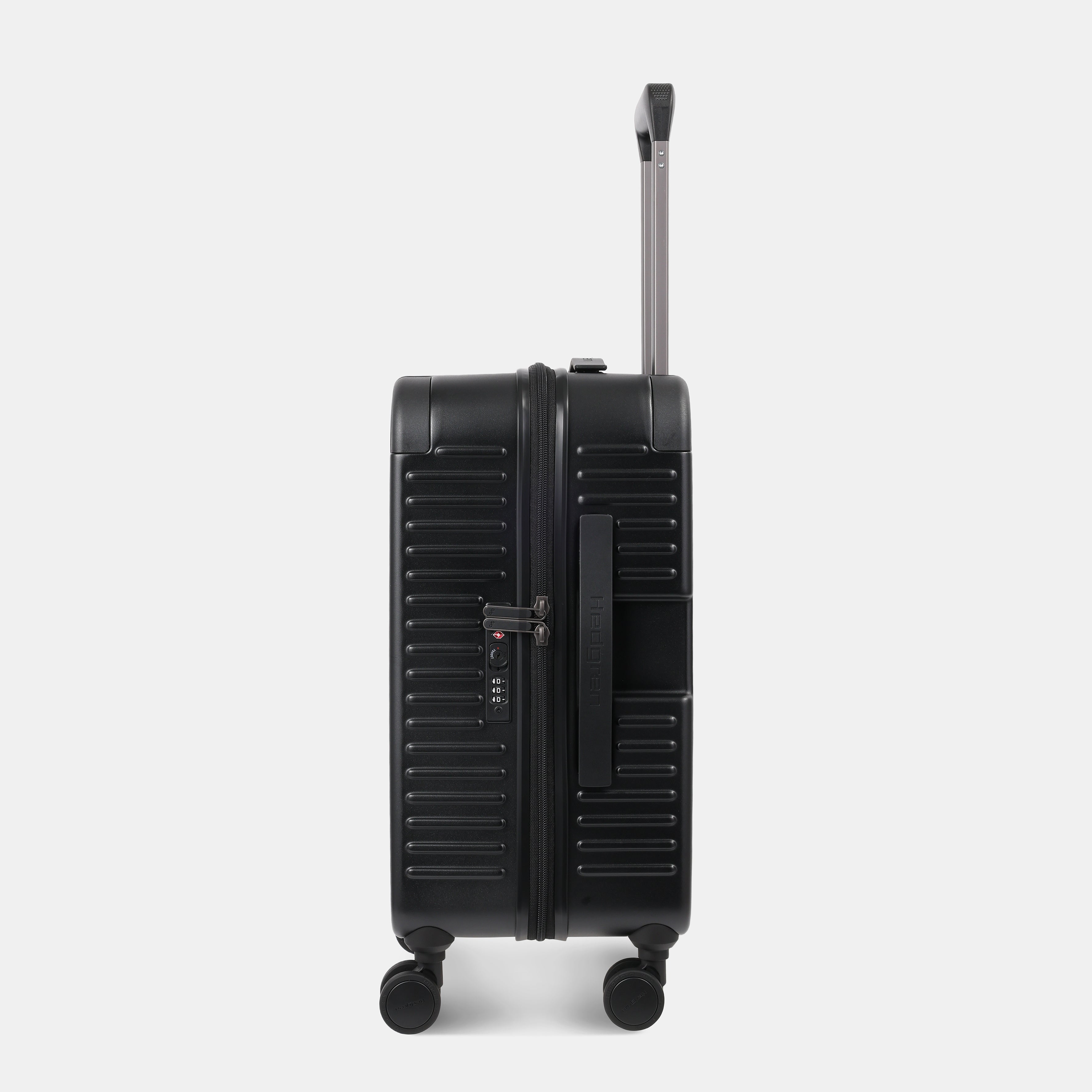 Side view of the Hedgren Raku Yuno Front Pocket Luggage in Black, showcasing the textured hard shell and expandable zipper detail. Shop Online at Mosafer Qatar